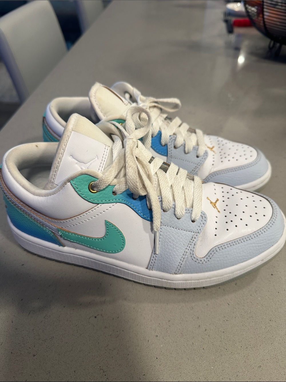 Nike Jordan 1 Lows with Teal & Light Blue Accents